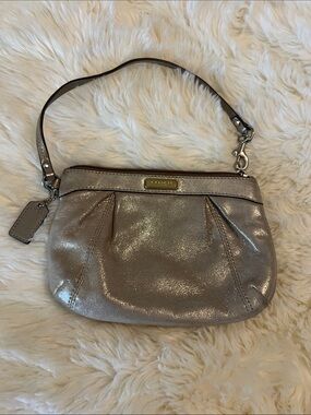 COACH Metallic Taupe Leather Wristlet with Gold Plaque